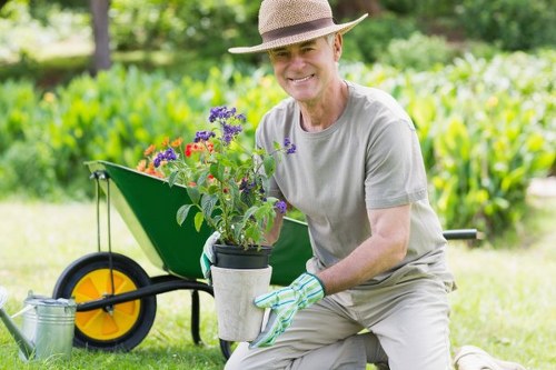 Gardener reviewing a quotation and confirming work schedule