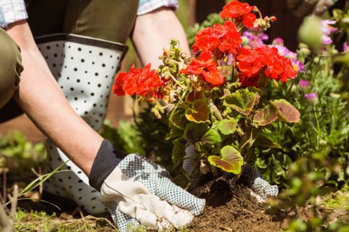 Gardener using protective equipment during outdoor work
